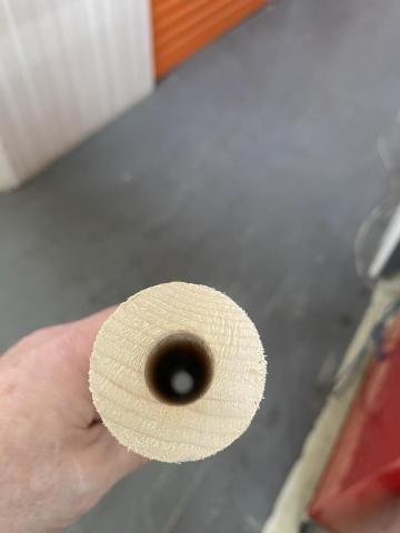 Forearm deep hole drilled for core.